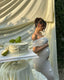 Avelynne Maternity Off-Shoulder Maxi Dress